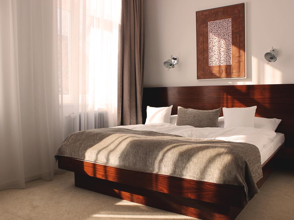 Hotel Lev Levice Habitación foto